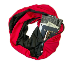 Versatile infinity scarf offers a secure and discreet place to store personal items.